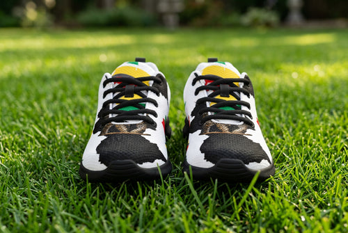 Pair of sneakers with Guyana map design