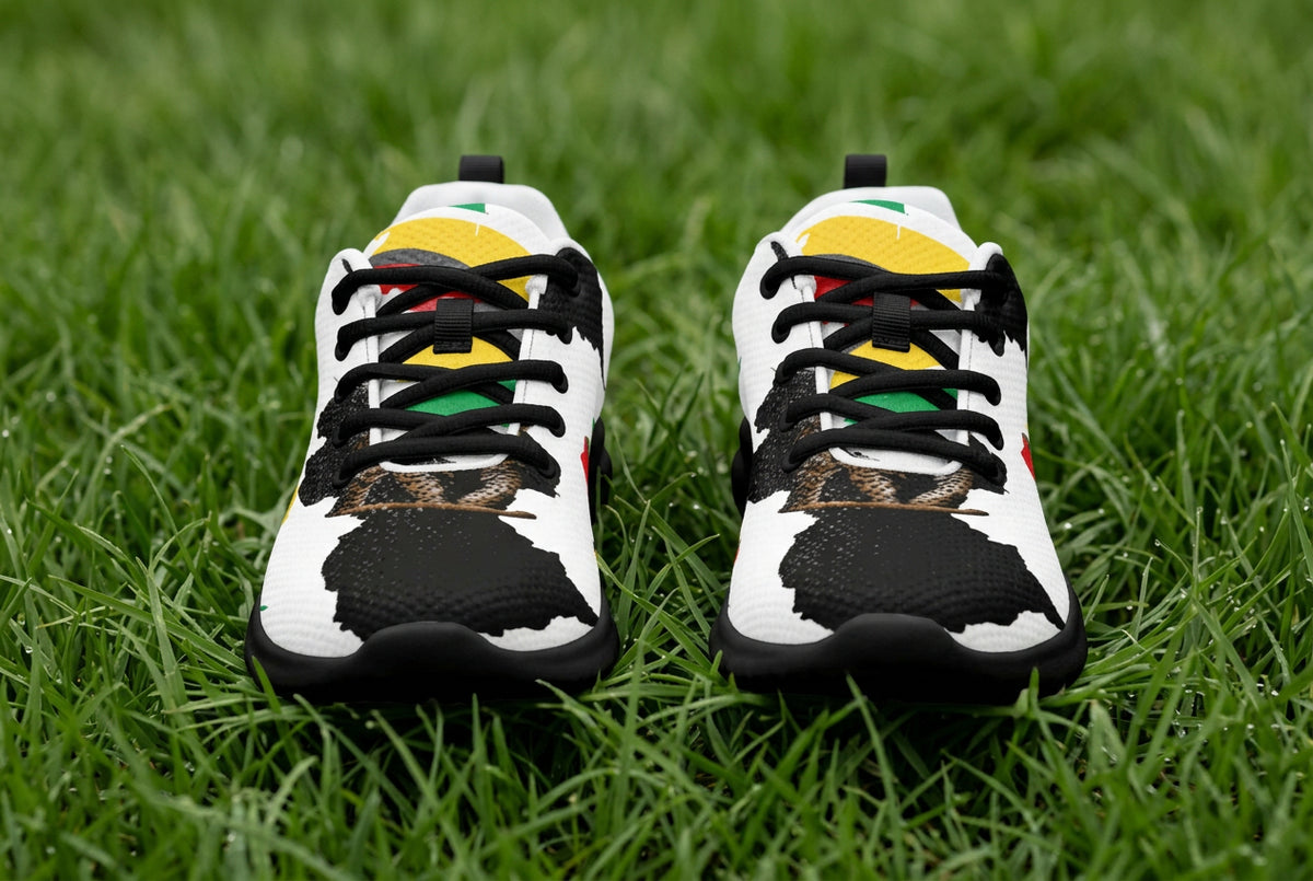 Pair of sneakers with a Guyana map and flag print on a white background