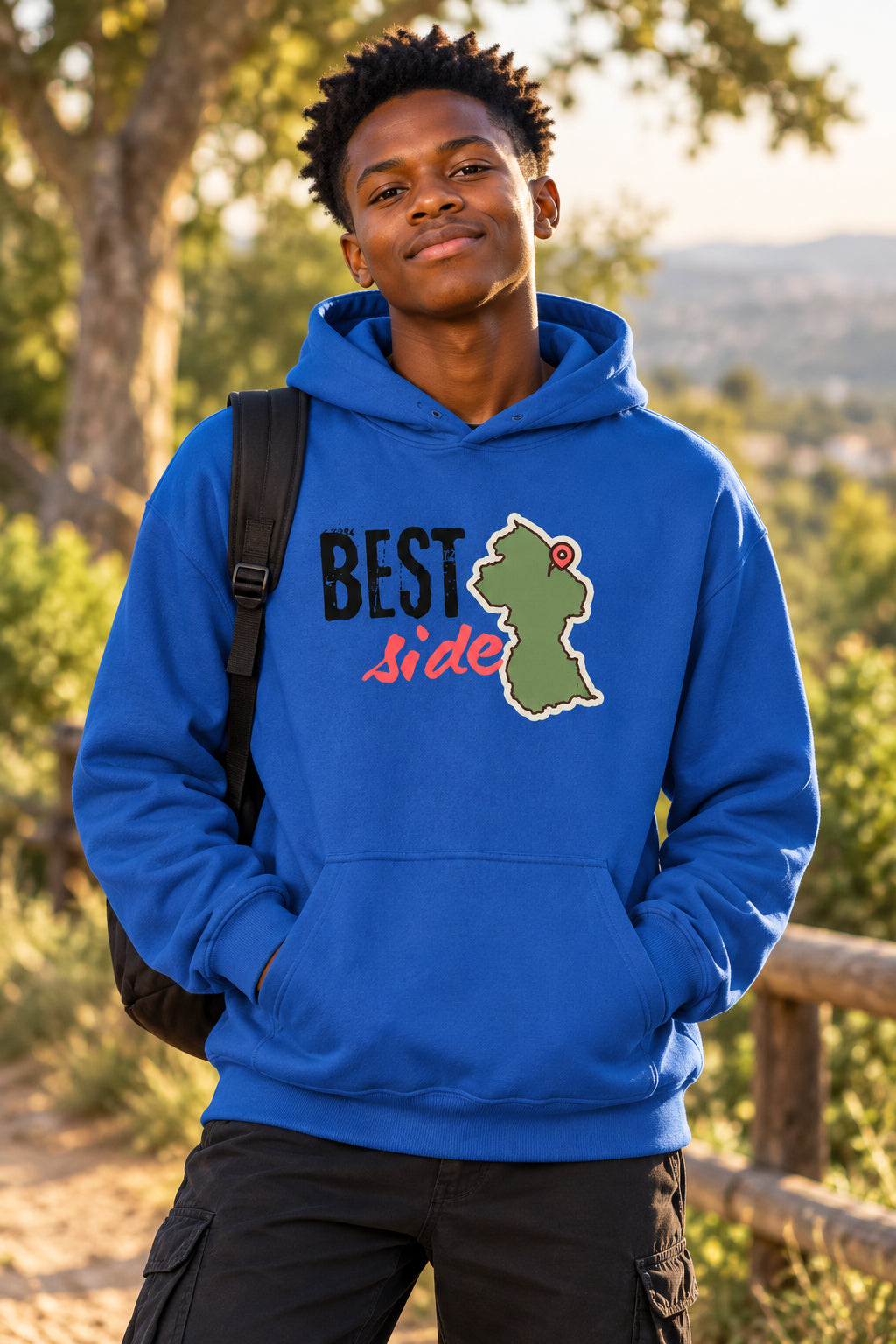 A royal blue pullover hoodie with a graphic on the chest that reads 'BEST side' in black and red text, alongside an outline map of Guyana with a red pin mark, shown on a plain white background.