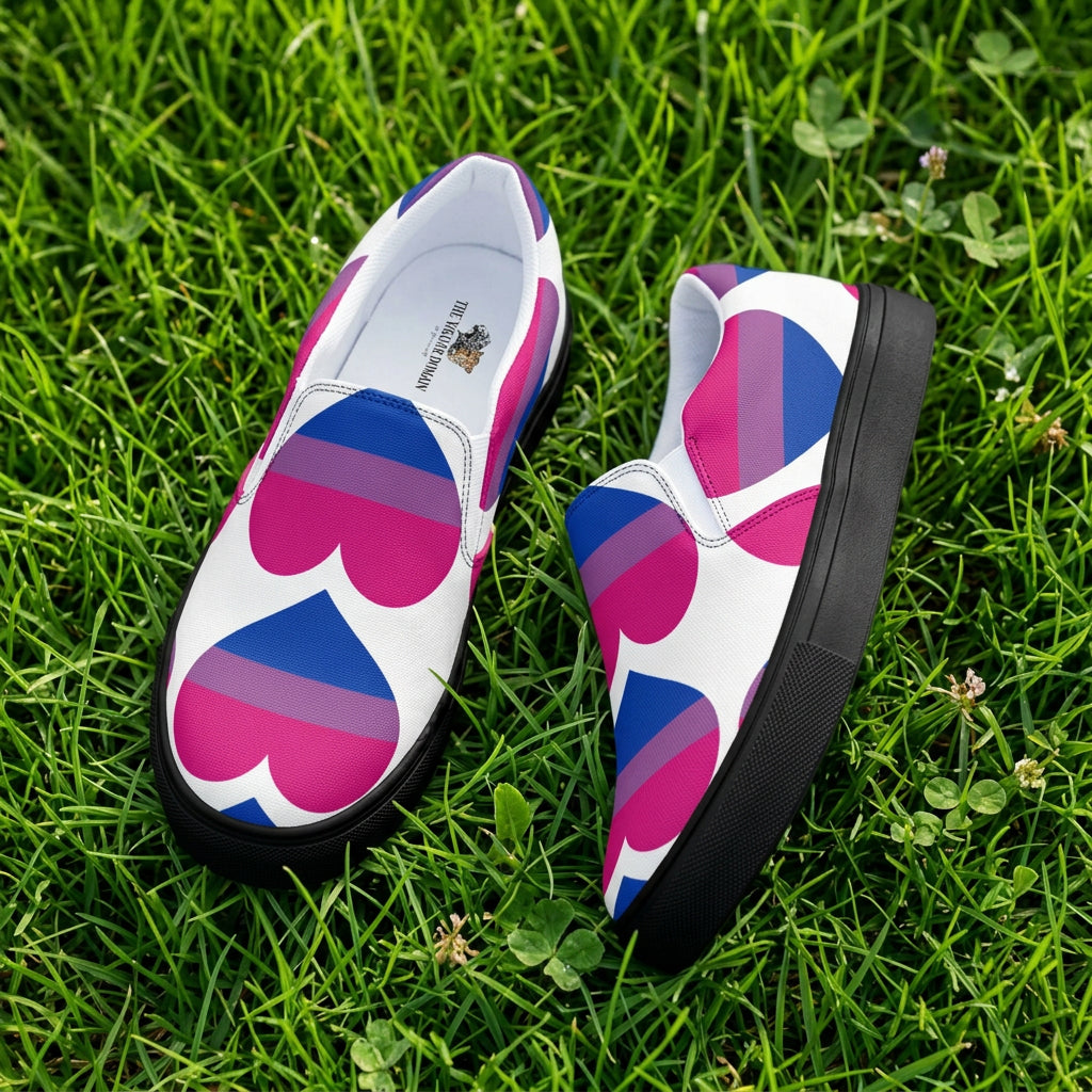 Colorful heart-patterned shoes on a white background