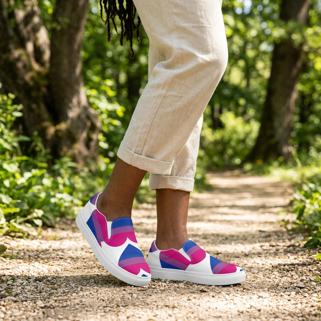 Colorful geometric-patterned slip-on shoes on a white background