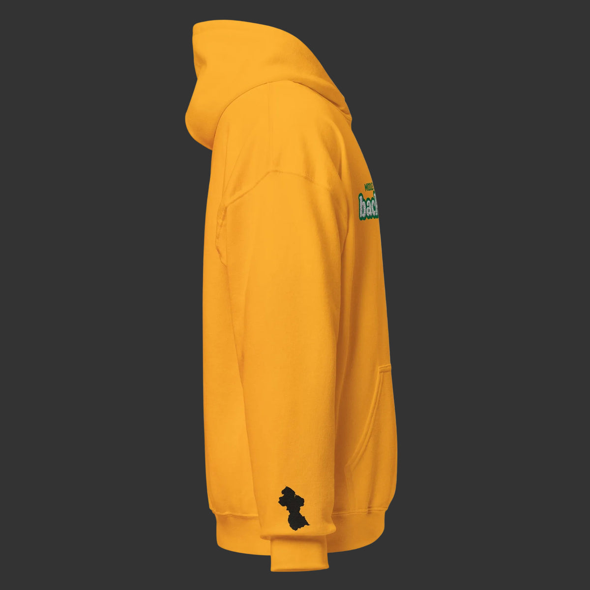 A side profile view of a gold hoodie featuring a small black silhouette logo on the left sleeve and a green and white graphic on the upper right shoulder, shown against a plain white background.