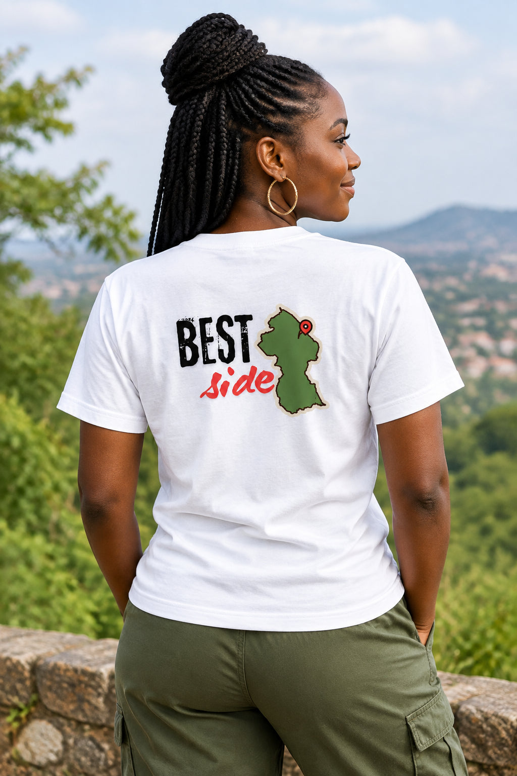 White short-sleeve t-shirt showing the back graphic with the text 'BEST Side' and an olive green Guyana map silhouette.