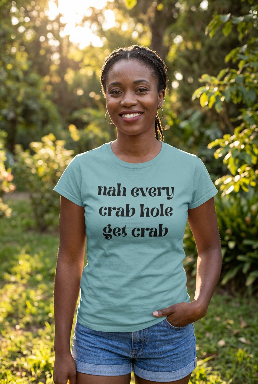 Light blue t-shirt with black Nah every crab hole get crab text on a white background