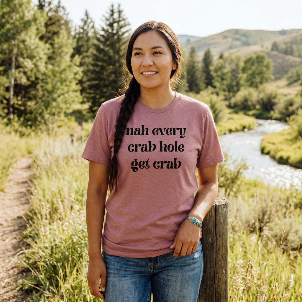 Pink t-shirt with black text on a white background