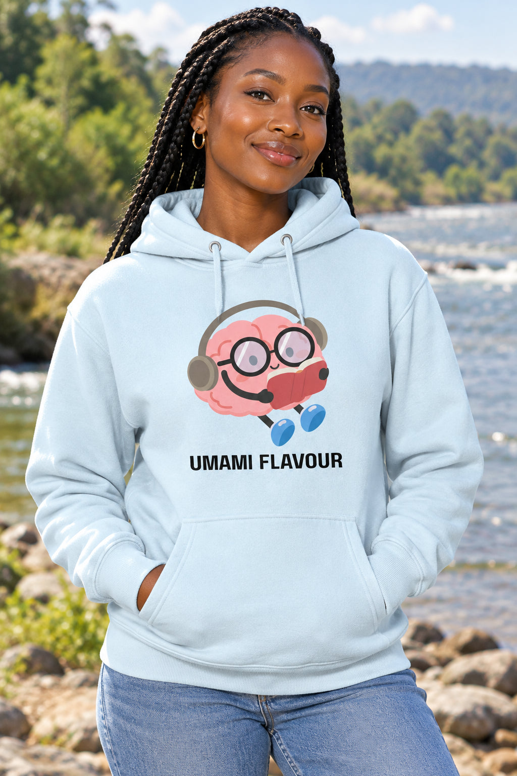 Light blue hoodie with a cartoon character and 'Umami Flavour' text on a white background