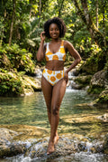 Bikini set with honey  pattern on a white background