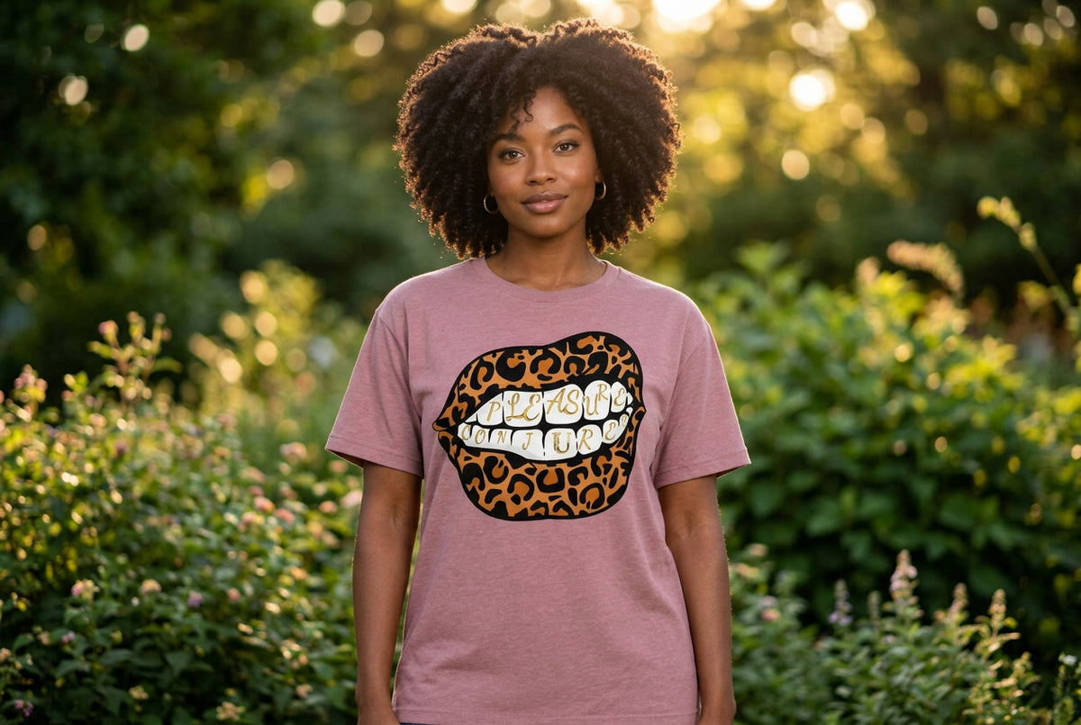 Pink t-shirt with leopard print lips graphic and text on a white background