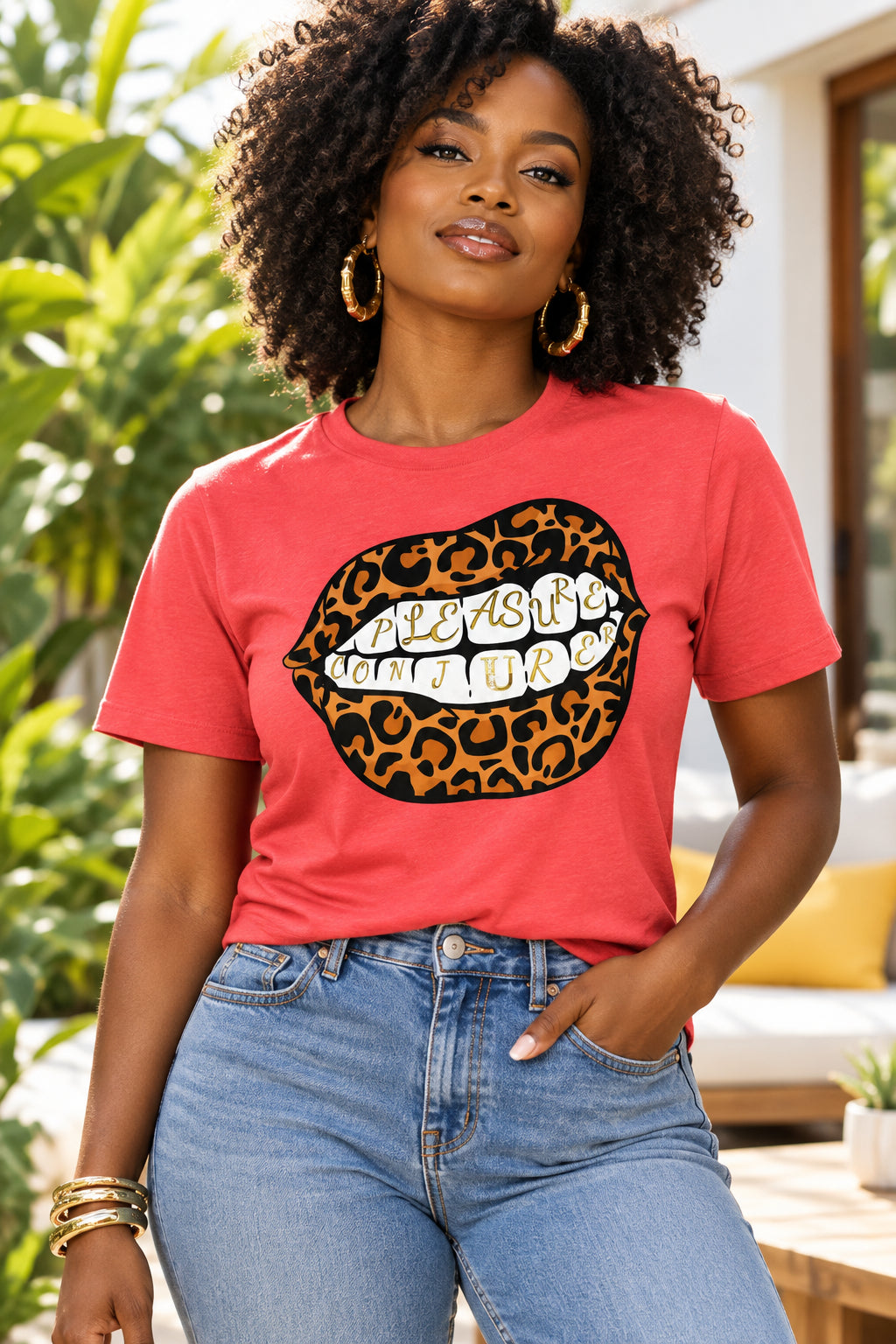 Red t-shirt with leopard print lips graphic and text on a white background