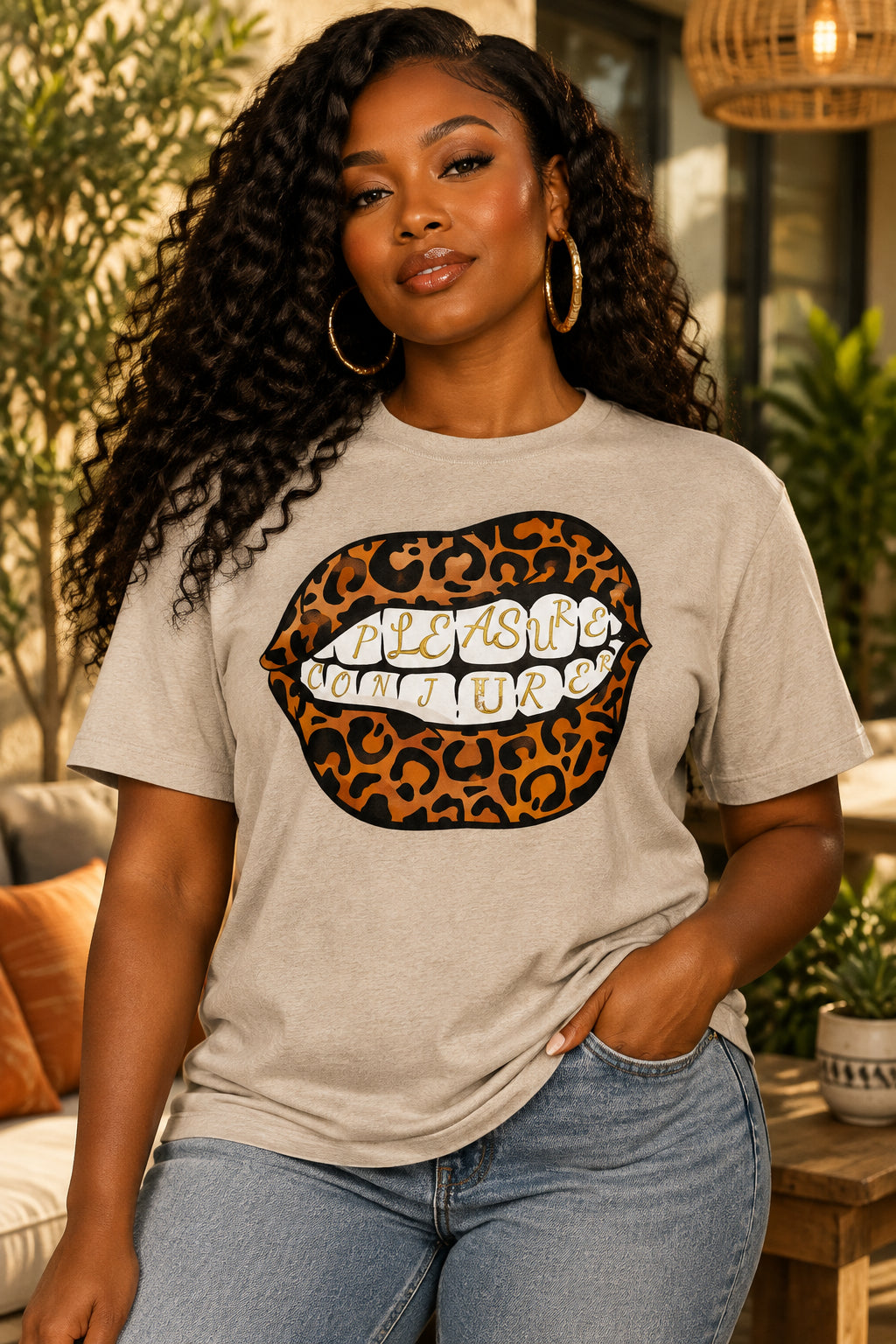 Beige t-shirt with leopard print lips graphic and text on a white background