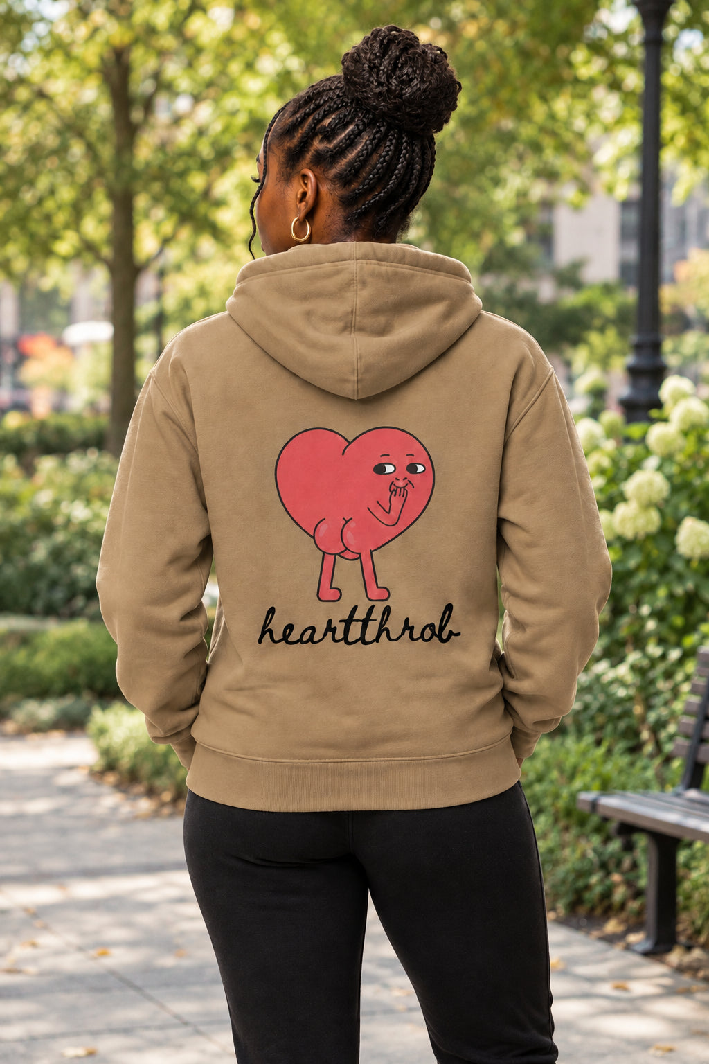 Brown hoodie with a cartoon heart and 'heartthrob' text on the back