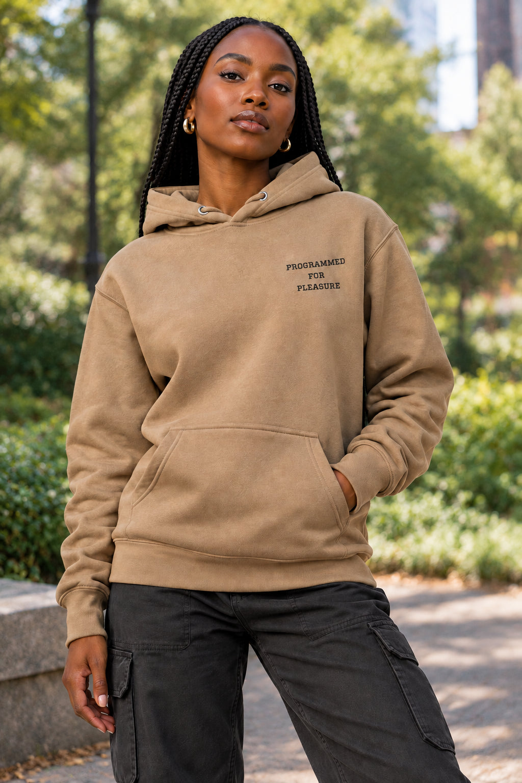 Brown hoodie with a logo on the chest and sleeves against a white background