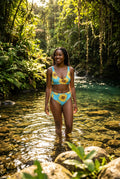 Bikini set with sunflower pattern on a blue background