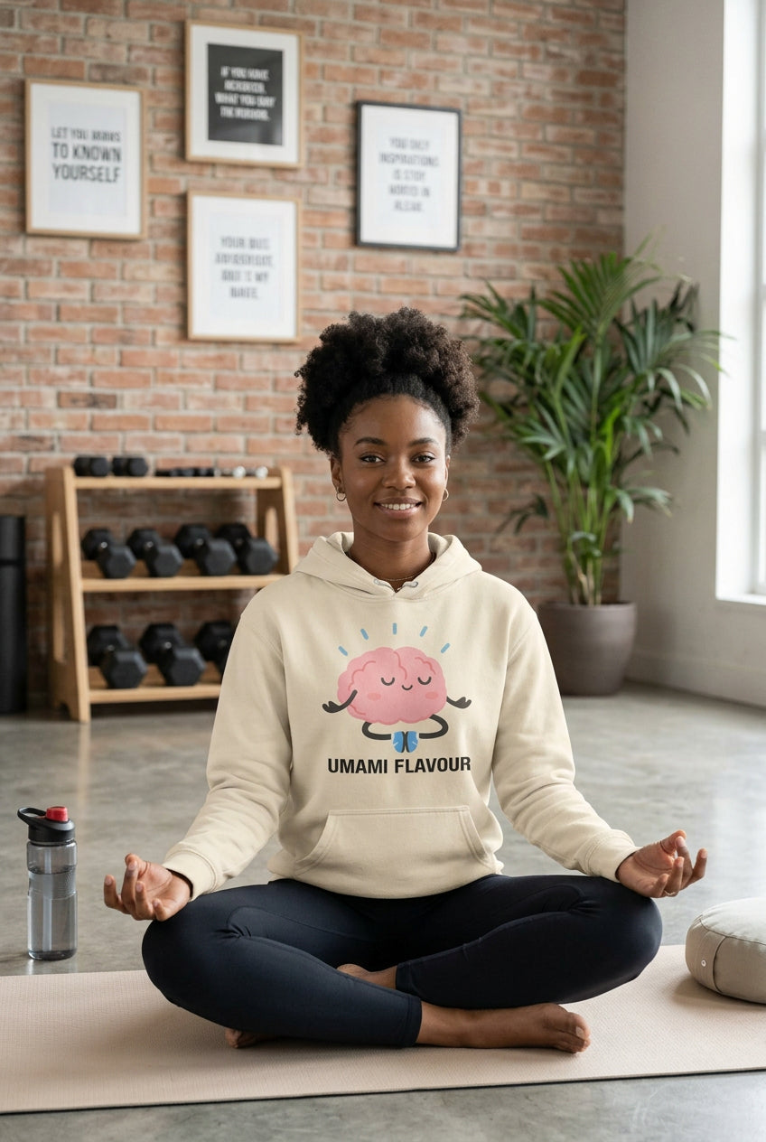 Beige hoodie with a cartoon brain design and 'Umami Flavour' text on a white background
