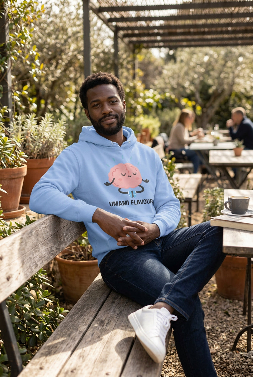 Light blue hoodie with a cartoon brain design and 'Umami Flavour' text on a white background