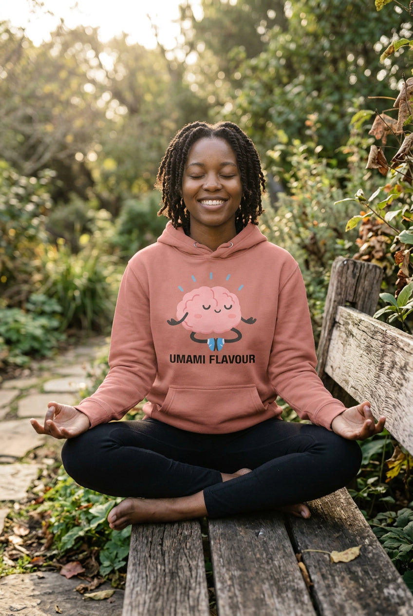 Coral hoodie with a brain graphic and 'Umami Flavour' text on a white background