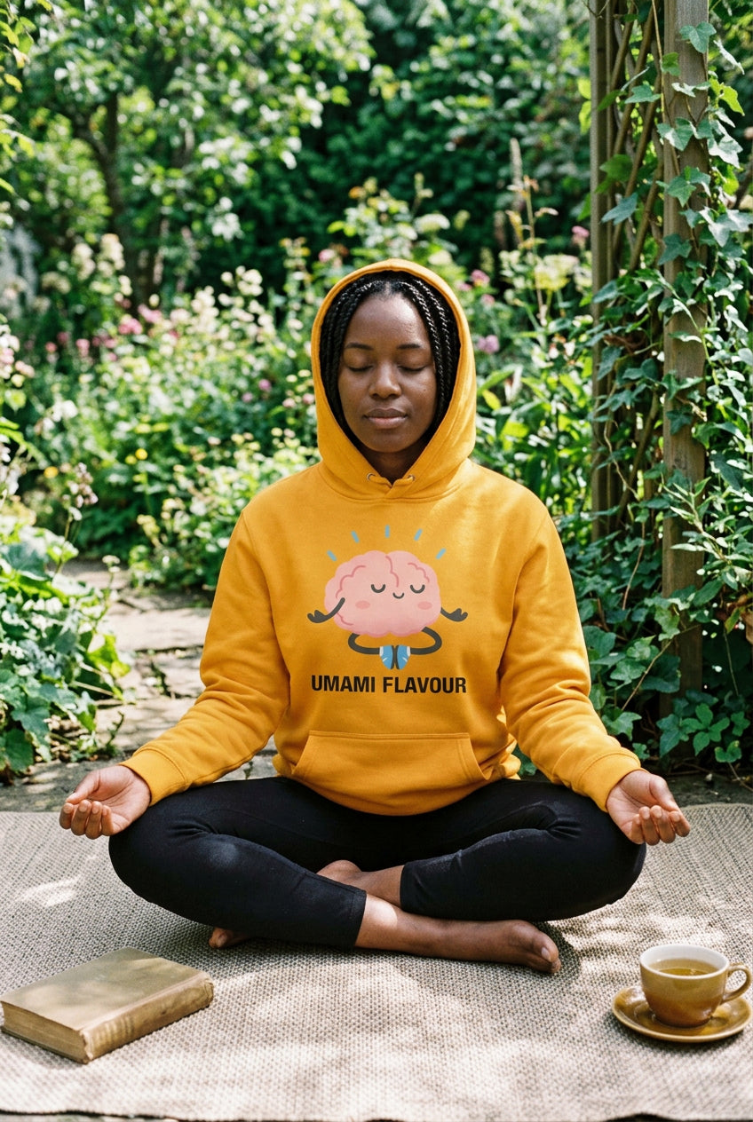 Orange hoodie with a cartoon brain design and 'Umami Flavour' text on a white background