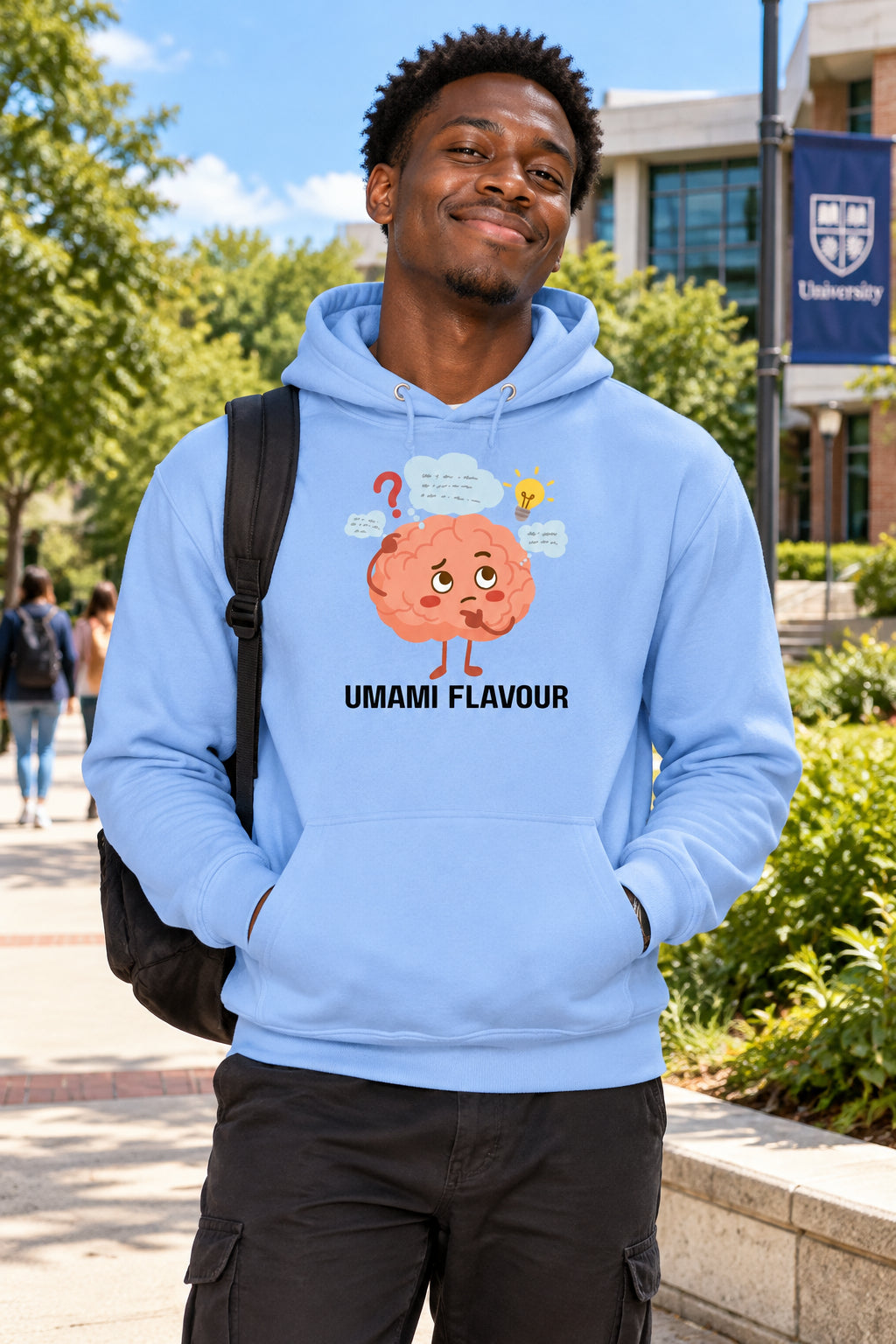 Light blue hoodie with a cartoon brain graphic and 'UMAMI FLAVOUR' text on a white background