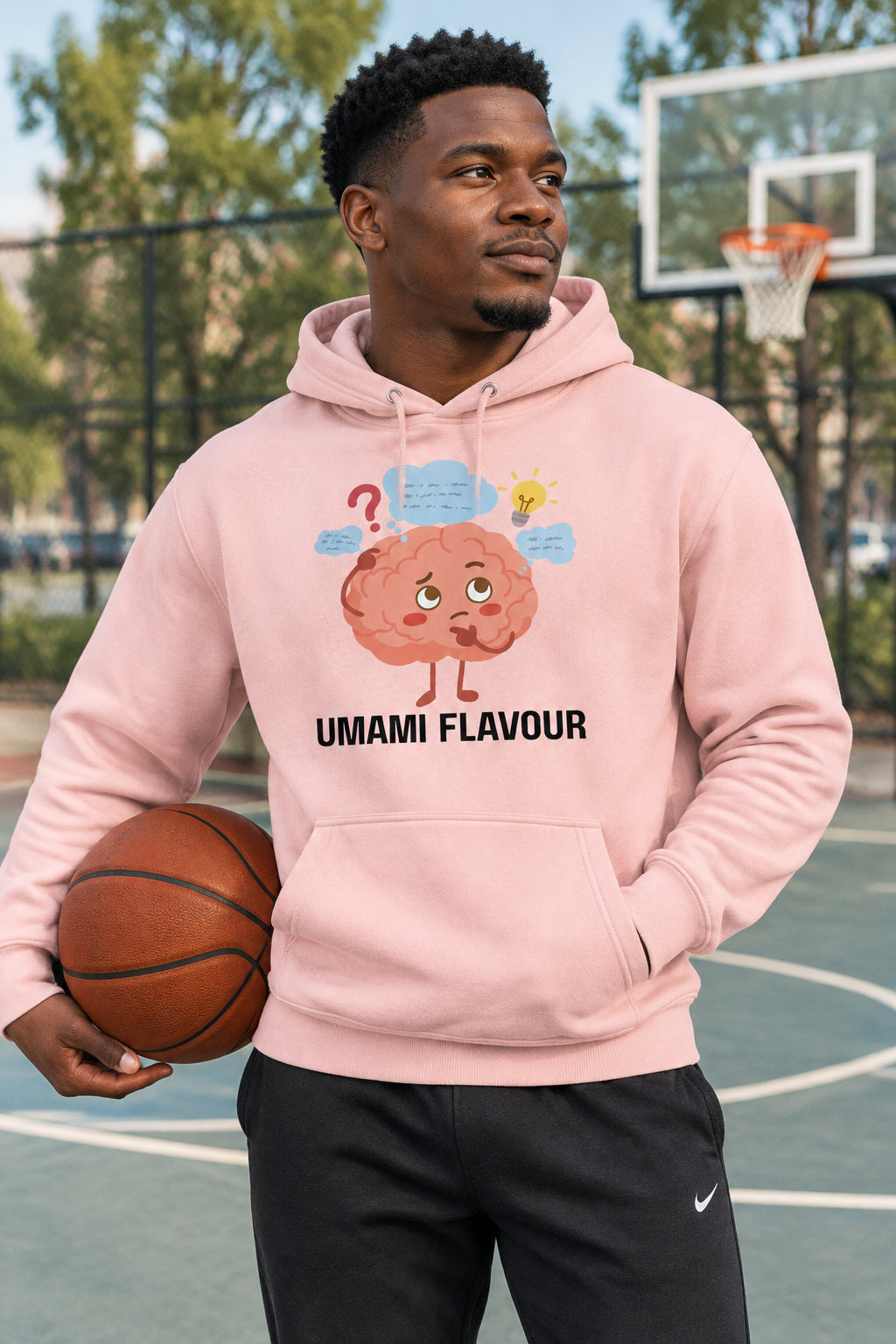 Pink hoodie with a cartoon brain graphic and 'UMAMI FLAVOUR' text on a white background