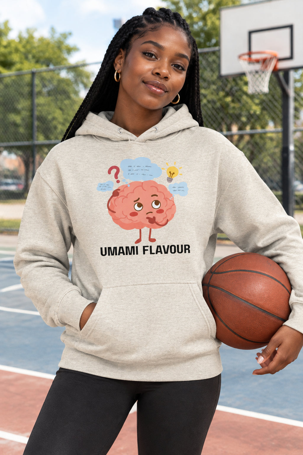 Beige hoodie with a cartoon brain graphic and 'Umami Flavour' text on a white background