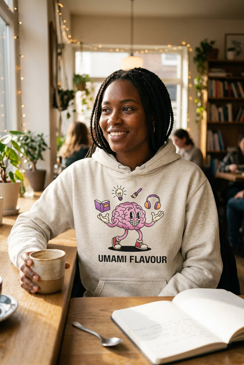 Beige hoodie with a cartoon brain design and 'Umami Flavour' text on a white background
