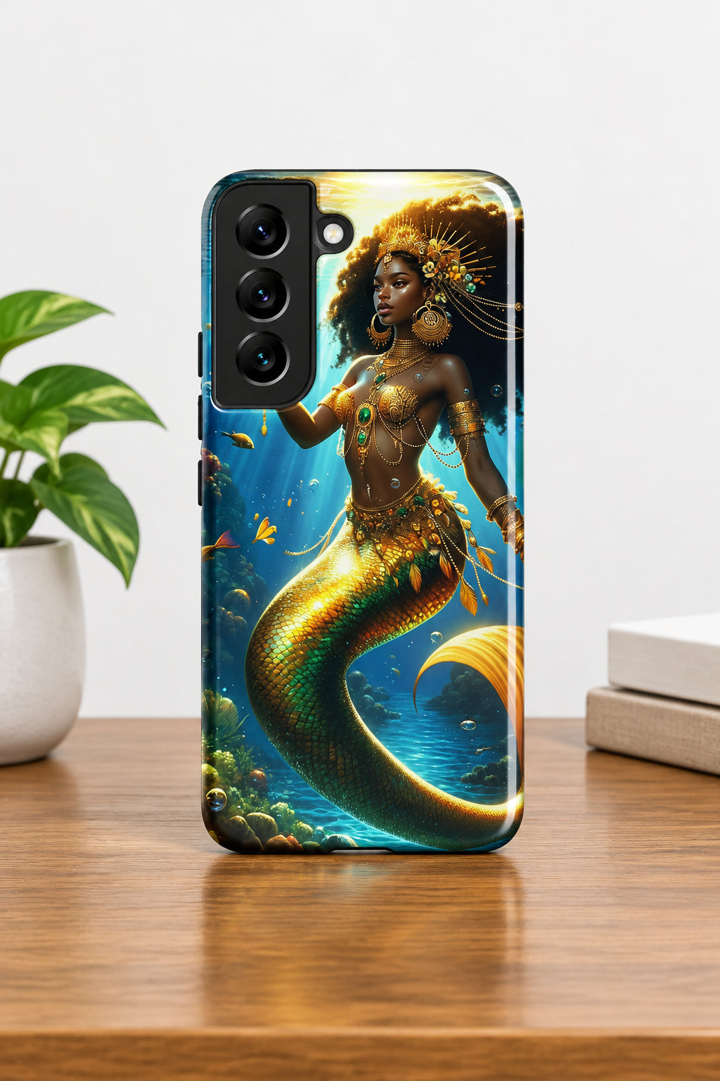 Phone case with a mermaid design on a white background