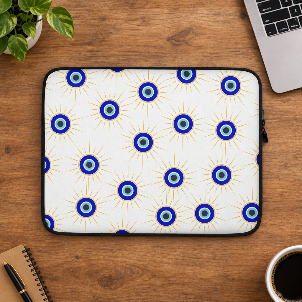 Laptop sleeve with blue eye pattern on a white background