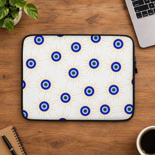 Laptop sleeve with blue eye pattern on a white background