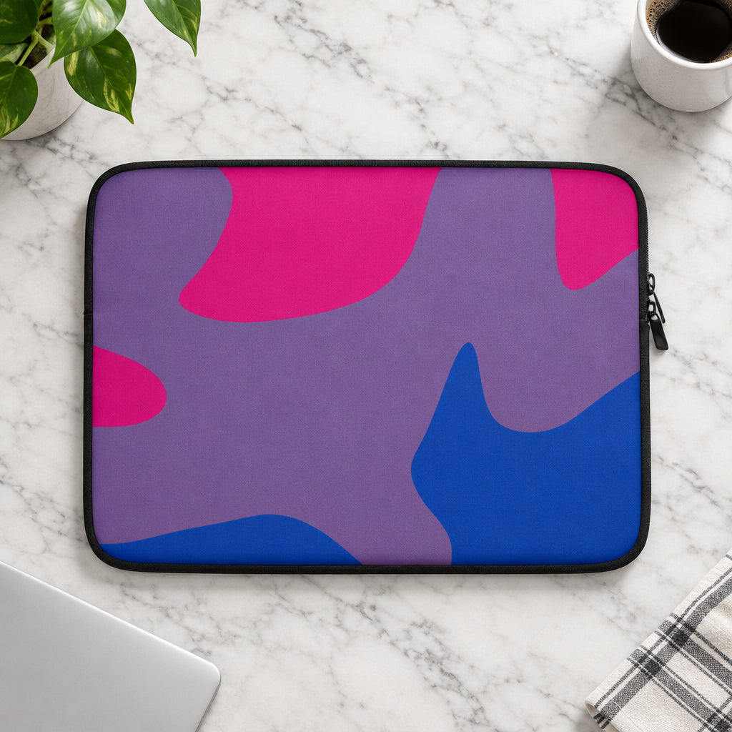 Laptop sleeve with pink and blue abstract pattern on a white background